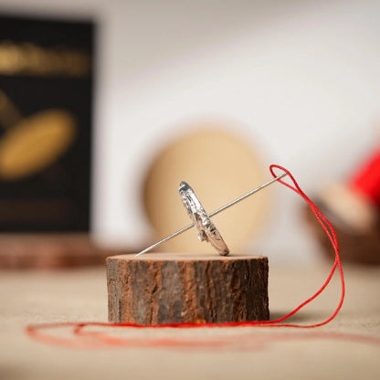 Needle Thru Coin by Nathan Kranzo and TCC Magic (incl. Regular Half Dollar)