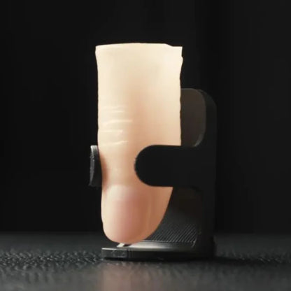 Thumb Tip Holder by Hau Jiun