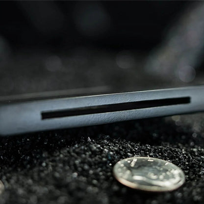 Coin Thru Anything by Nathan Kranzo